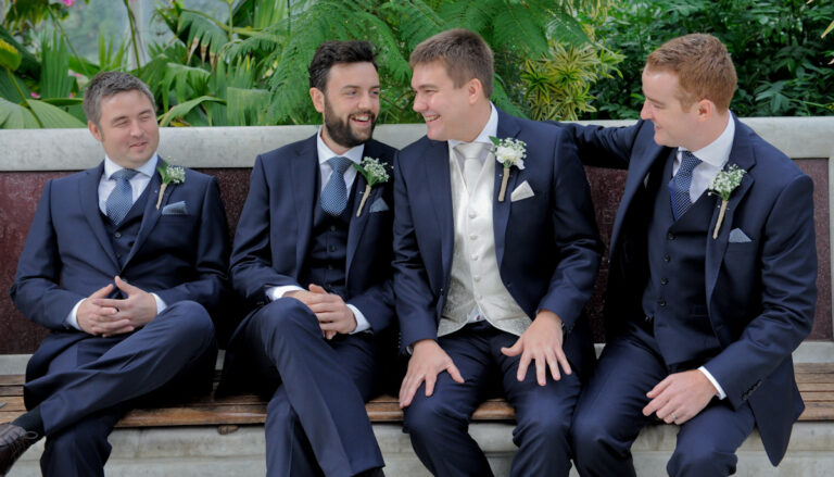 Groom and ushers in the Palm House by Northwest Wedding Photographer Adam Edwards