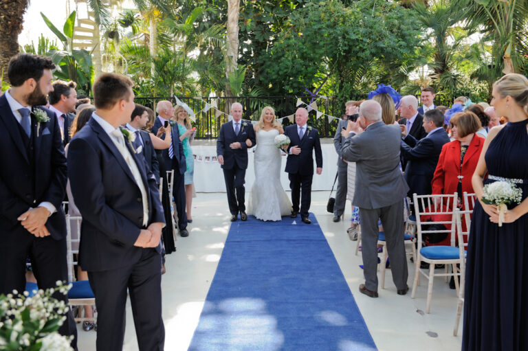 Bride with two dads in Palm House Liverpool by Northwest Wedding Photographer Adam Edwards