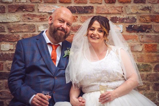Wedding guests at Elizabeth Gaskell's House in Manchester by photographer Adam Edwards