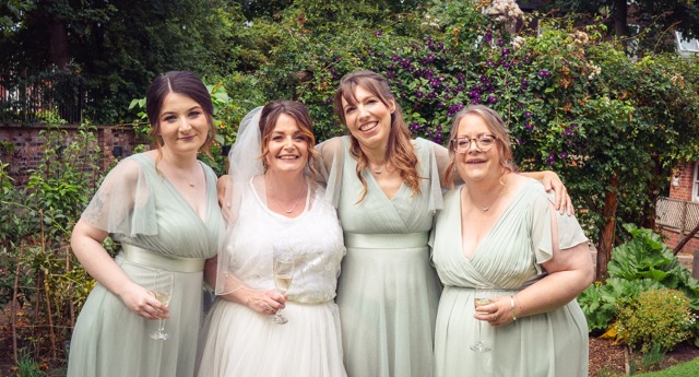 Wedding guests at Elizabeth Gaskell's House in Manchester by photographer Adam Edwards