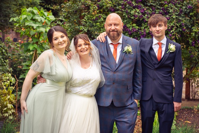 Wedding guests at Elizabeth Gaskell's House in Manchester by photographer Adam Edwards